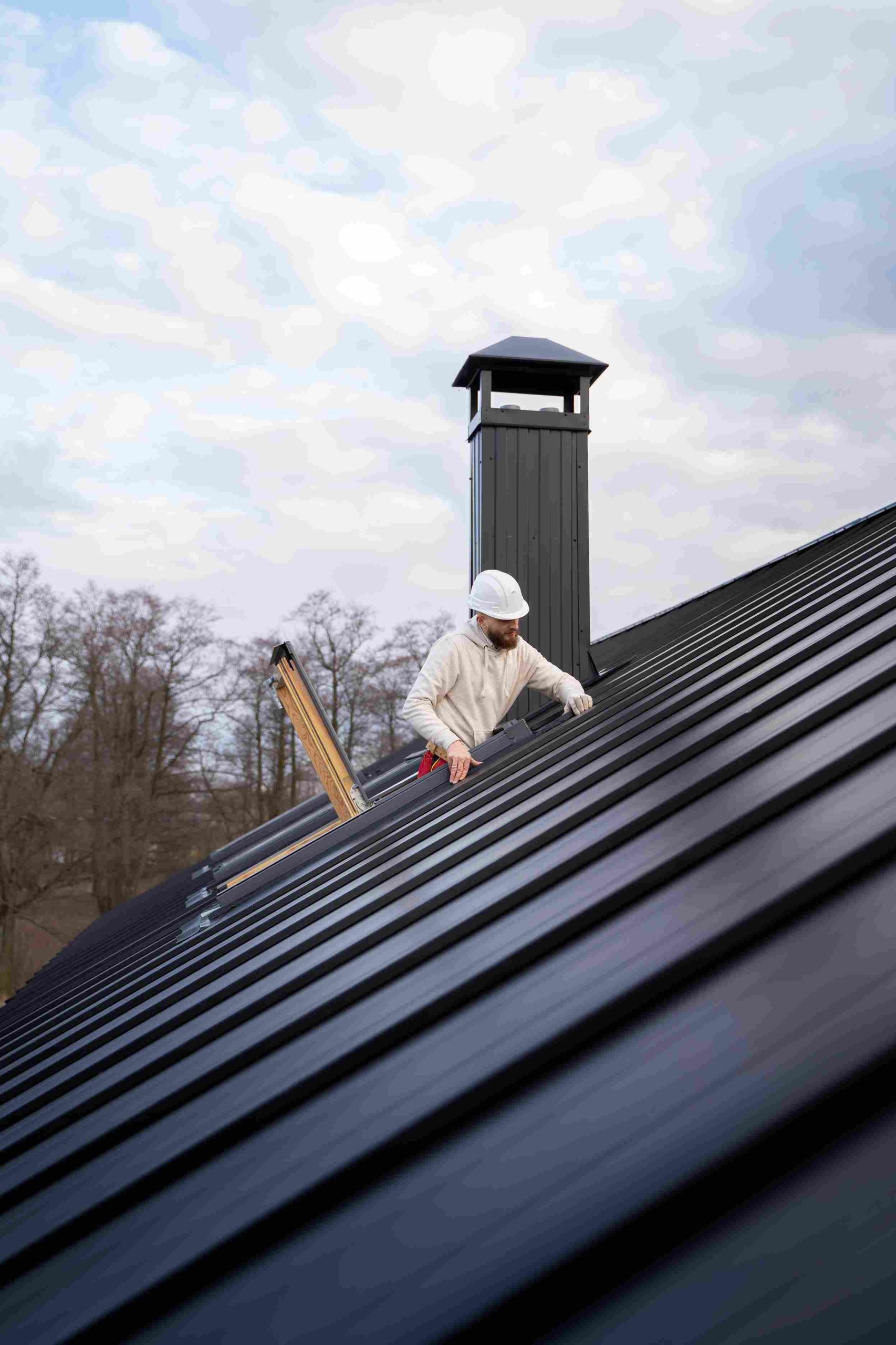 full-shot-man-working-roof_11zon